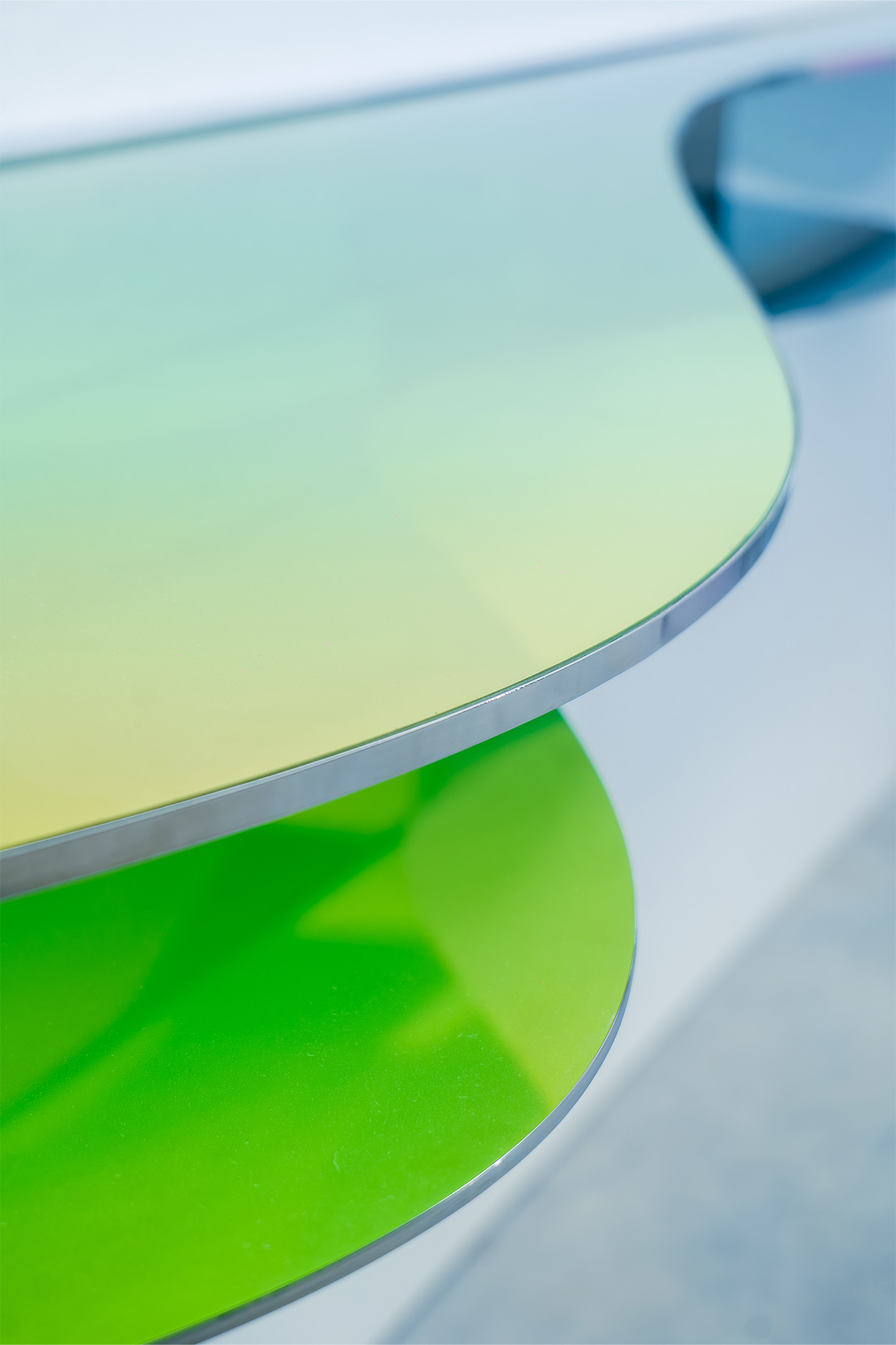 Console C03 by ODA LIK – side view with translucent green and blue reflections