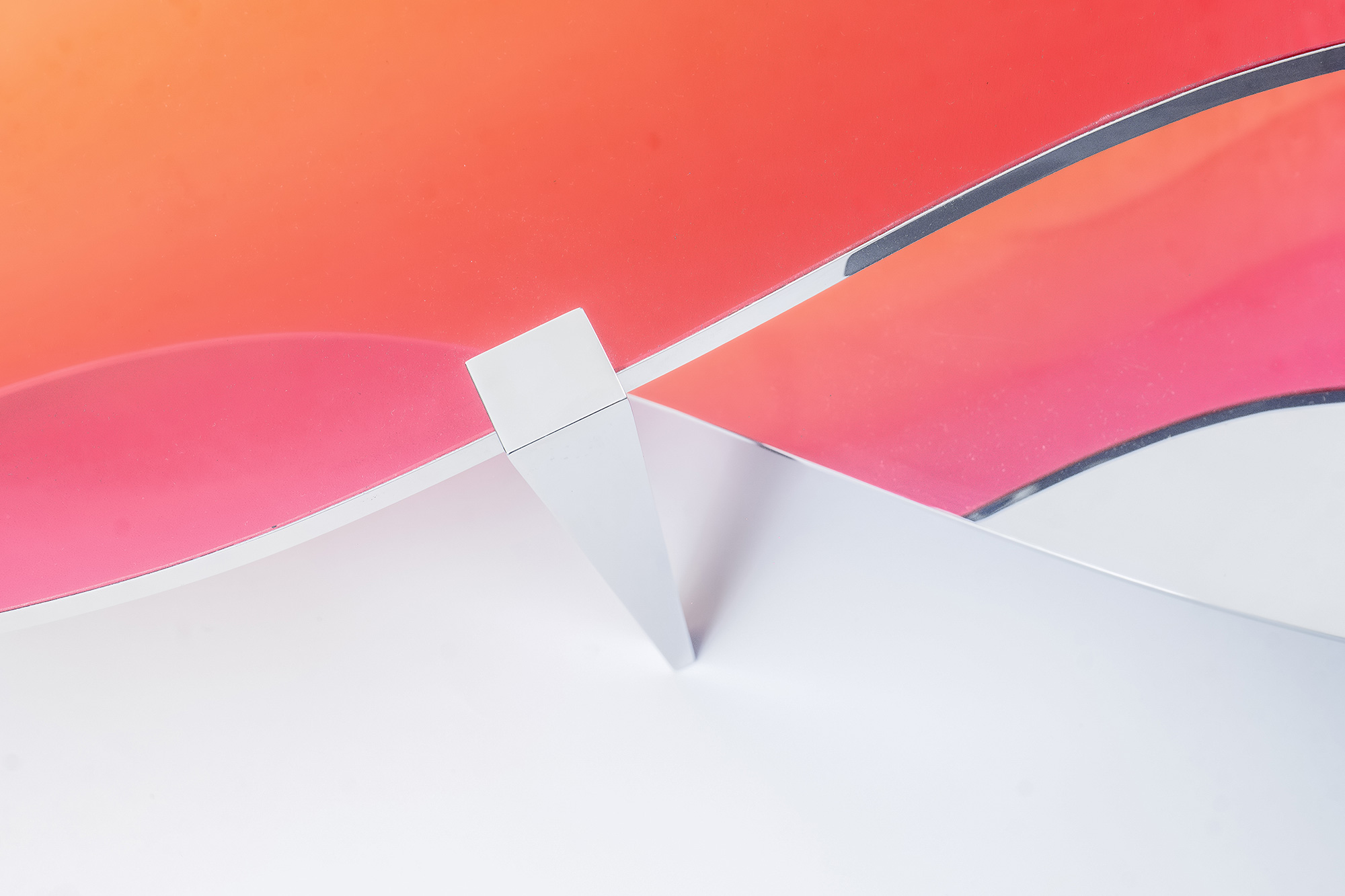 Low Table LT01 by ODA LIK – warm hue transition and polished steel outline