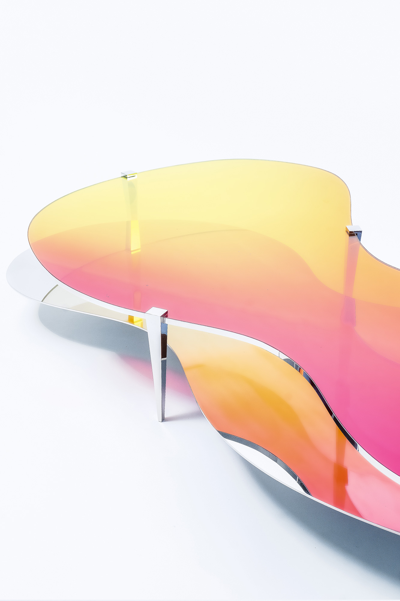 Low Table LT01 by ODA LIK – reflection detail of pink-orange dichroic surface