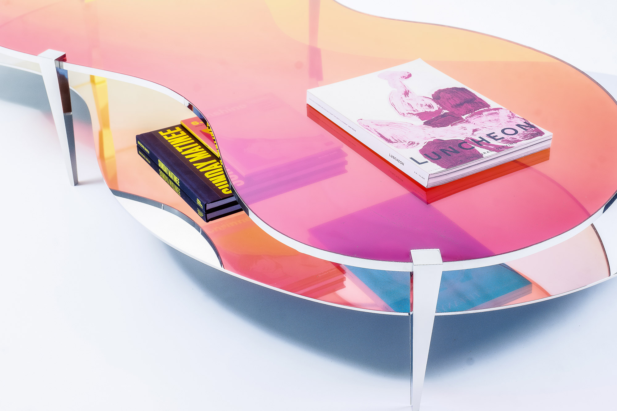 Low Table LT01 by ODA LIK – vibrant color interplay in curved surface